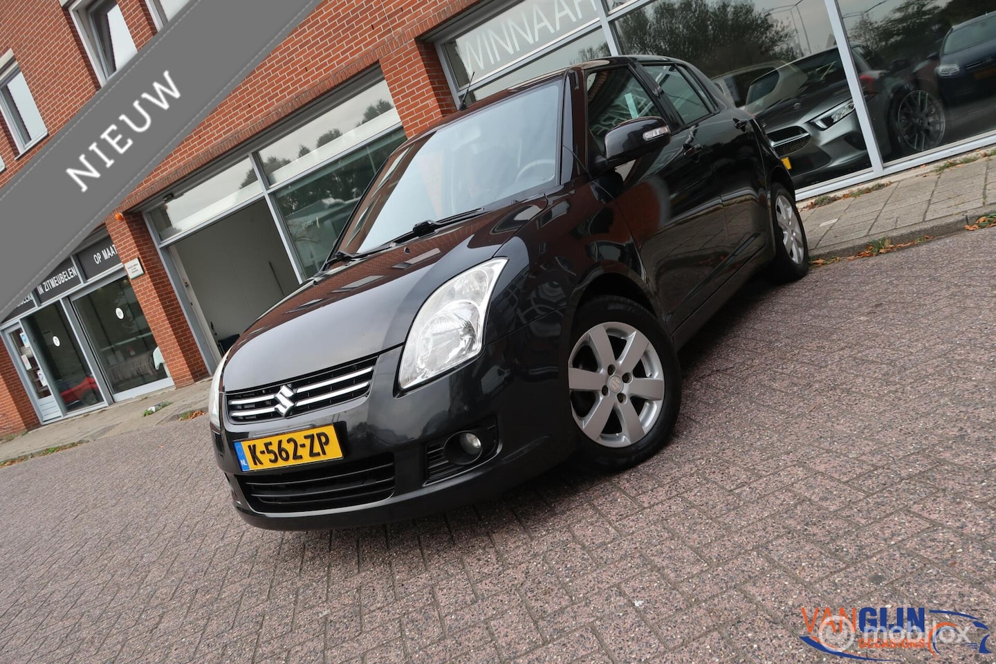Suzuki Swift - 1.3 Comfort Airco inklapbare spiegels stoel verwarming - AutoWereld.nl