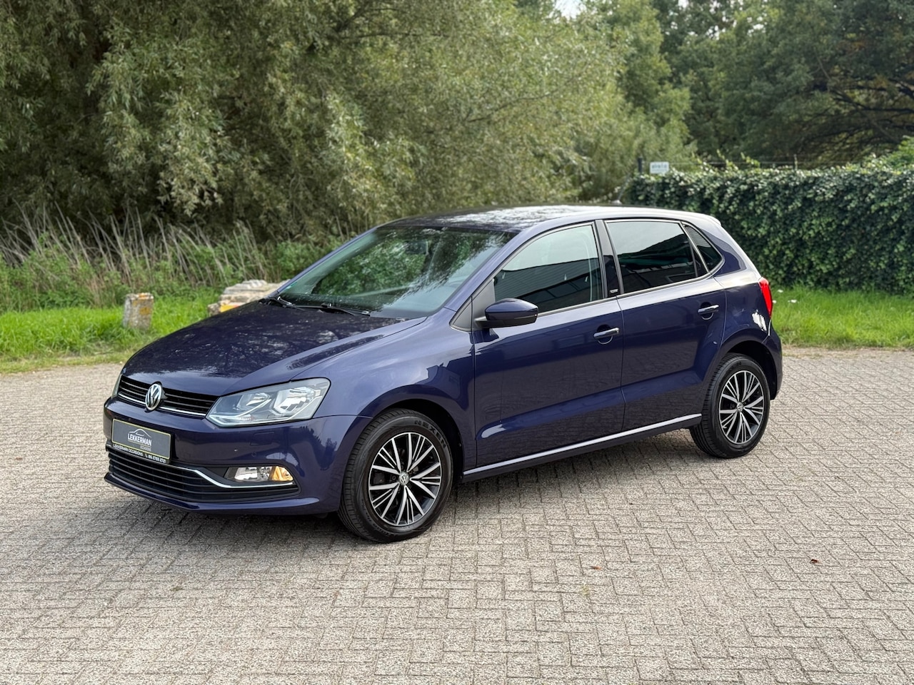 Volkswagen Polo - 1.2 TSI Highline PDC I BLUETOOTH I CRUISE I 90PK I STOELVER - AutoWereld.nl