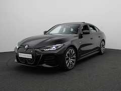 BMW i4 - eDrive40 M Sportpakket Pro | Achteruitrijcamera | Schuifdak | Parking Assistant | Harman K