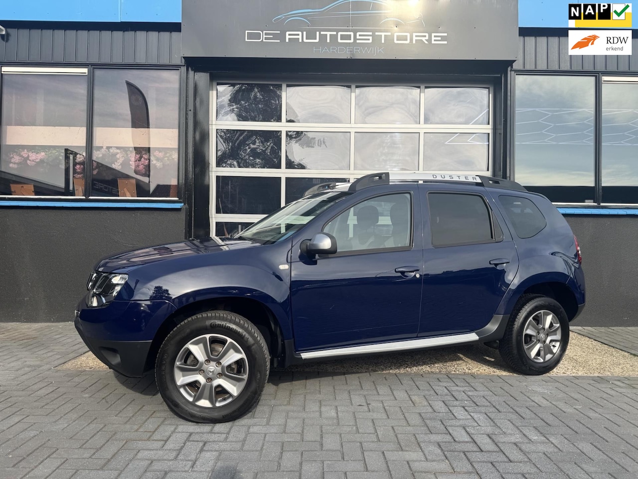 Dacia Duster - 1.2 TCe 4x2 Lauréate 1e Eig navi Airco Cruise Trekhaak Zeer nette Auto!!! - AutoWereld.nl