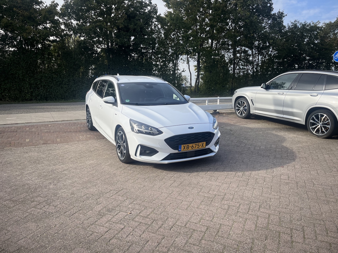 Ford Focus Wagon - 1.5 EcoBoost ST Line Business TREKHAAK HEAD UP CAMERA B&O LANE ASSIST - AutoWereld.nl