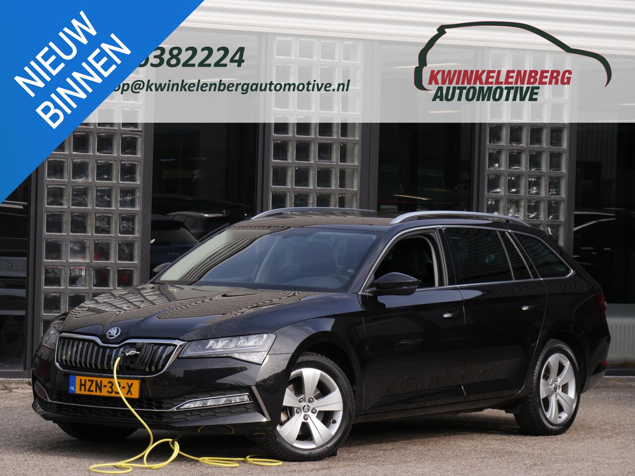 Skoda Superb Combi - 1.4TSI iV BUSINESS EDITION PLUS/ CAMERA/ PDC V+A - AutoWereld.nl
