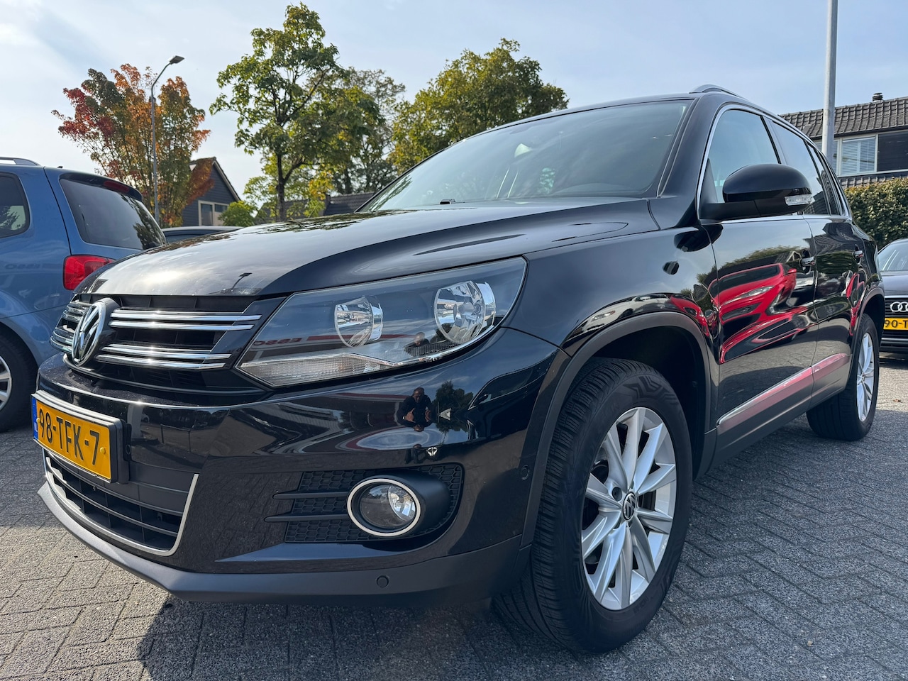 Volkswagen Tiguan - 1.4 TSI Sport&Style,Apk 26/10/26,Airco,Cruise,Navi,Nap,Trekhaak - AutoWereld.nl