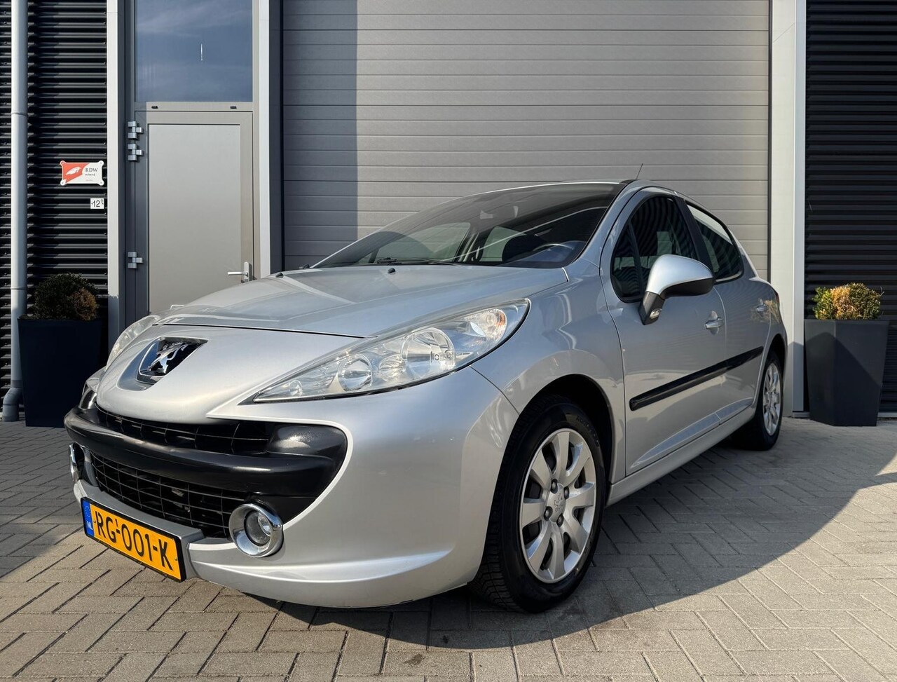 Peugeot 207 - 1.4-16V XR/130.000/Vol jaar APK/Airco/Carplay - AutoWereld.nl