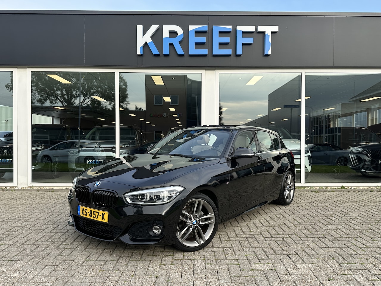 BMW 1-serie - 118i High Executive Schuifdak | Leder - AutoWereld.nl