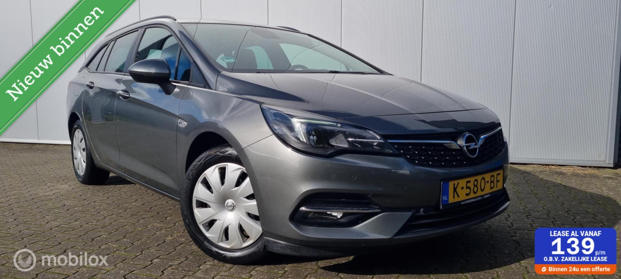 Opel Astra Sports Tourer - 1.2 Business Edition TREKHAAK/CAMERA/NAP - AutoWereld.nl