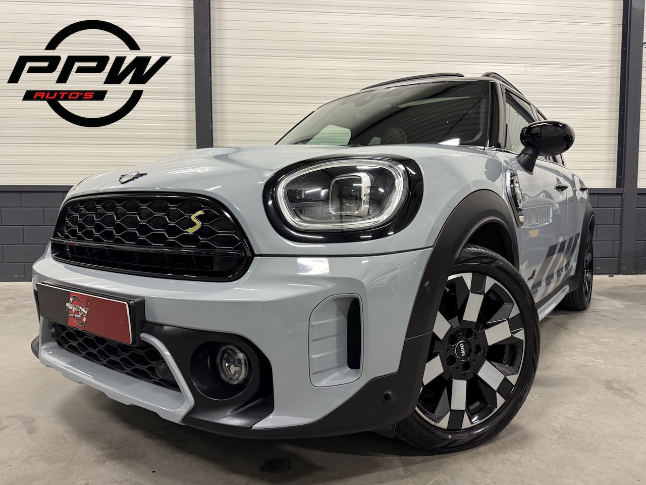 MINI Countryman - 2.0 Cooper SE ALL4 Untamed Edition MOMENTUM-GREY/HIGHLAND-GREEN LEER/PANO/H&K/HEAD-UP/CAME - AutoWereld.nl