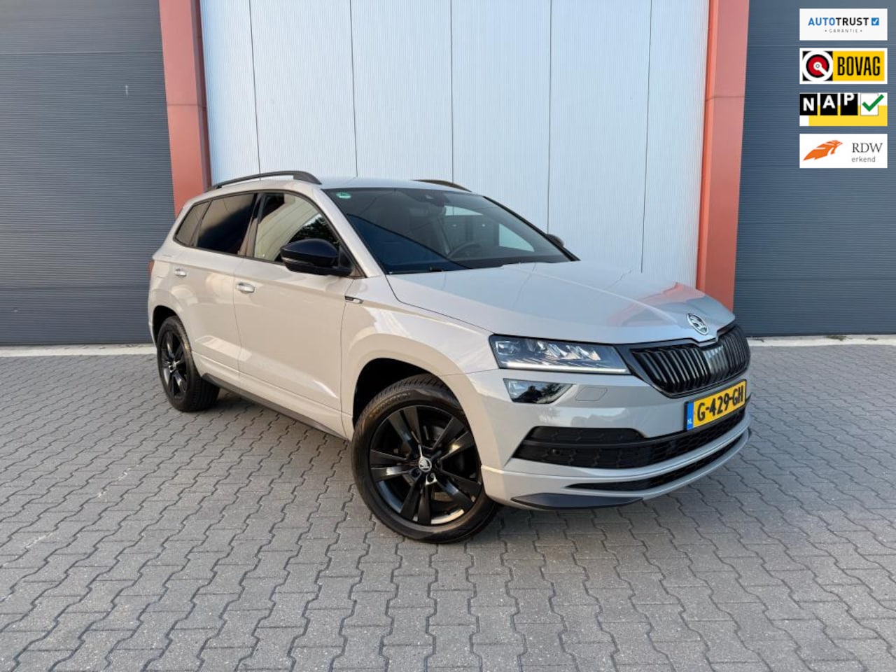 Skoda Karoq - 1.5 TSI ACT Sportline|Camera|Stoelverwarming|Virtual display - AutoWereld.nl
