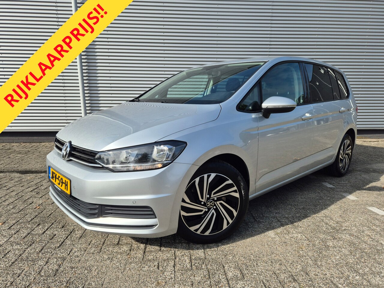 Volkswagen Touran - 1.2 TSI 7persoons,clima,wegklapbare trekhaak,stoelverwarming,parkeersensoren - AutoWereld.nl
