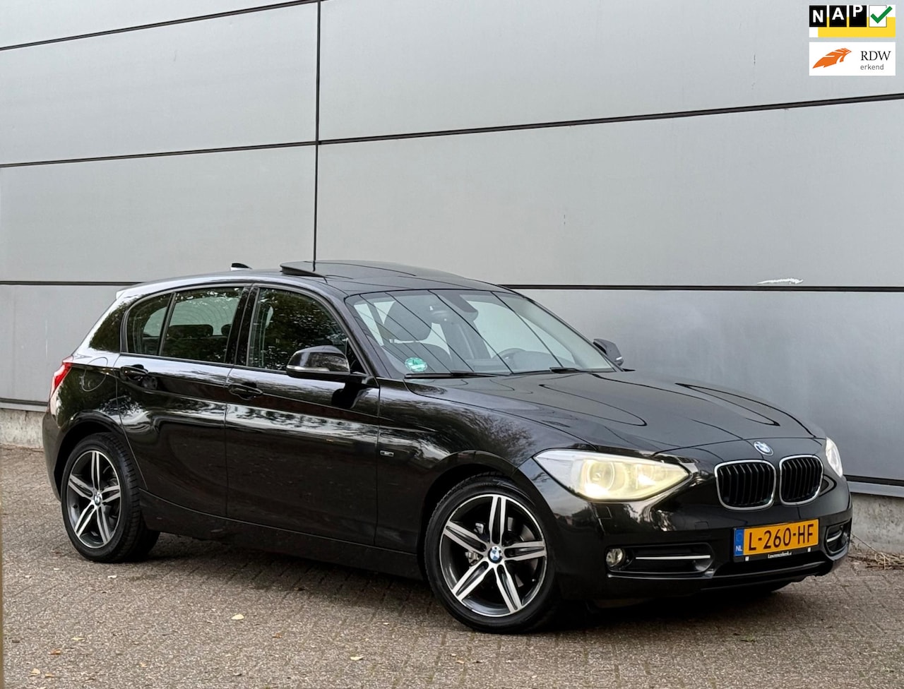 BMW 1-serie - 116i High Executive 1e Eignr |Automaat |Pano |Xenon |Led |Stoelverw |Navi |Clima |Lmv |Nap - AutoWereld.nl