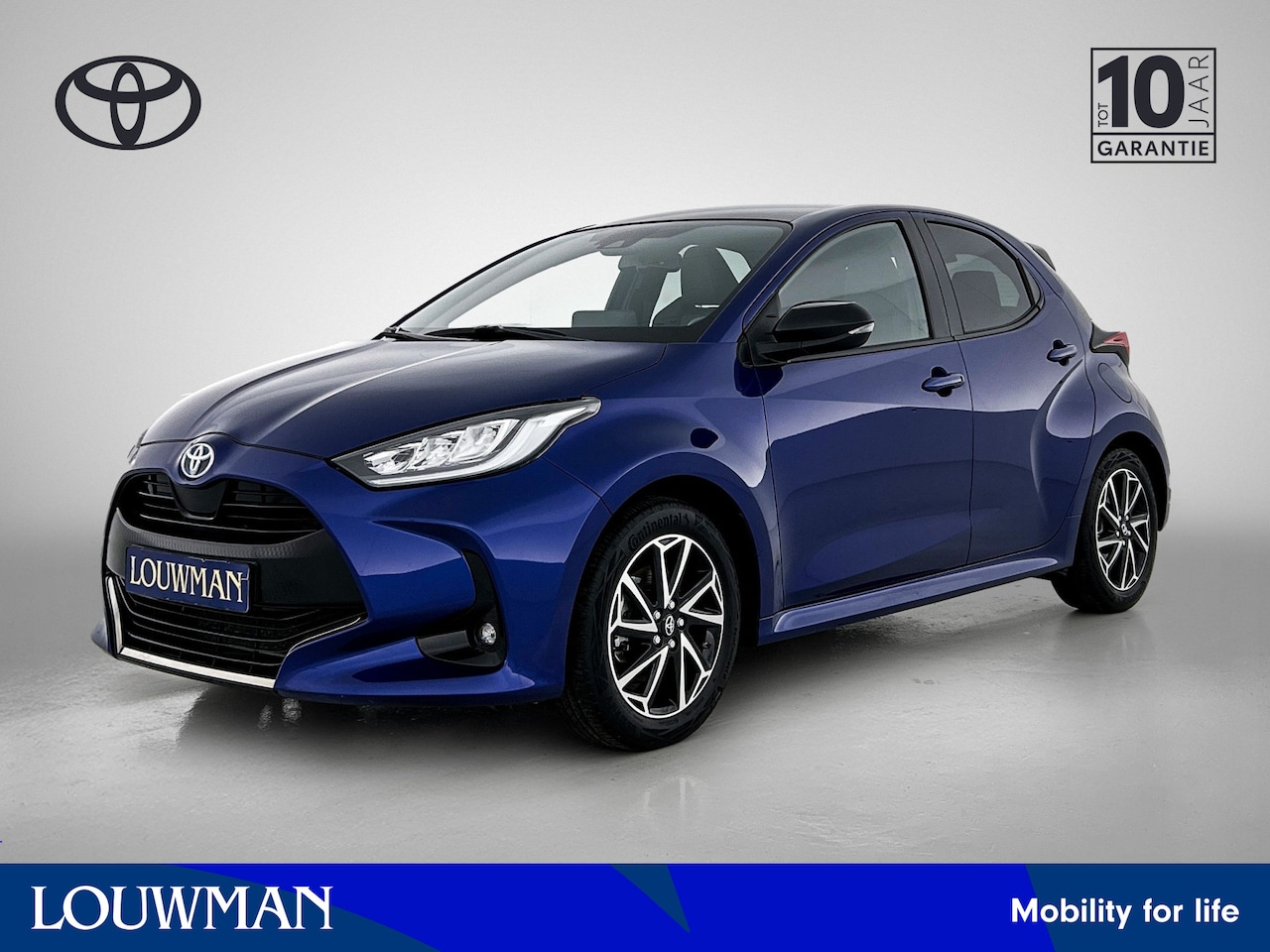 Toyota Yaris - 1.5 Hybrid First Edition Limited | Panorama dak | Half leder-stof bekleding | LM velgen | - AutoWereld.nl