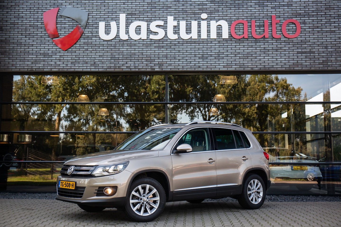 Volkswagen Tiguan - 1.4 TSI Sport&Style , Trekhaak, Cruise control, - AutoWereld.nl