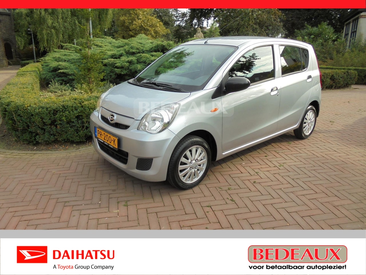 Daihatsu Cuore - 1.0 69pk 5D Euro5 Comfort Plus S • 12 mnd BOVAG garantie. - AutoWereld.nl