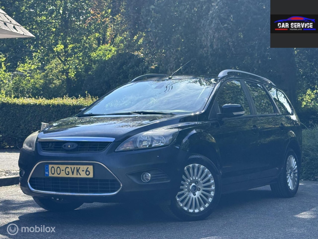 Ford Focus Wagon - 1.8 Titanium Flexi Fuel/PDC/LMW/NAVI/NAP - AutoWereld.nl