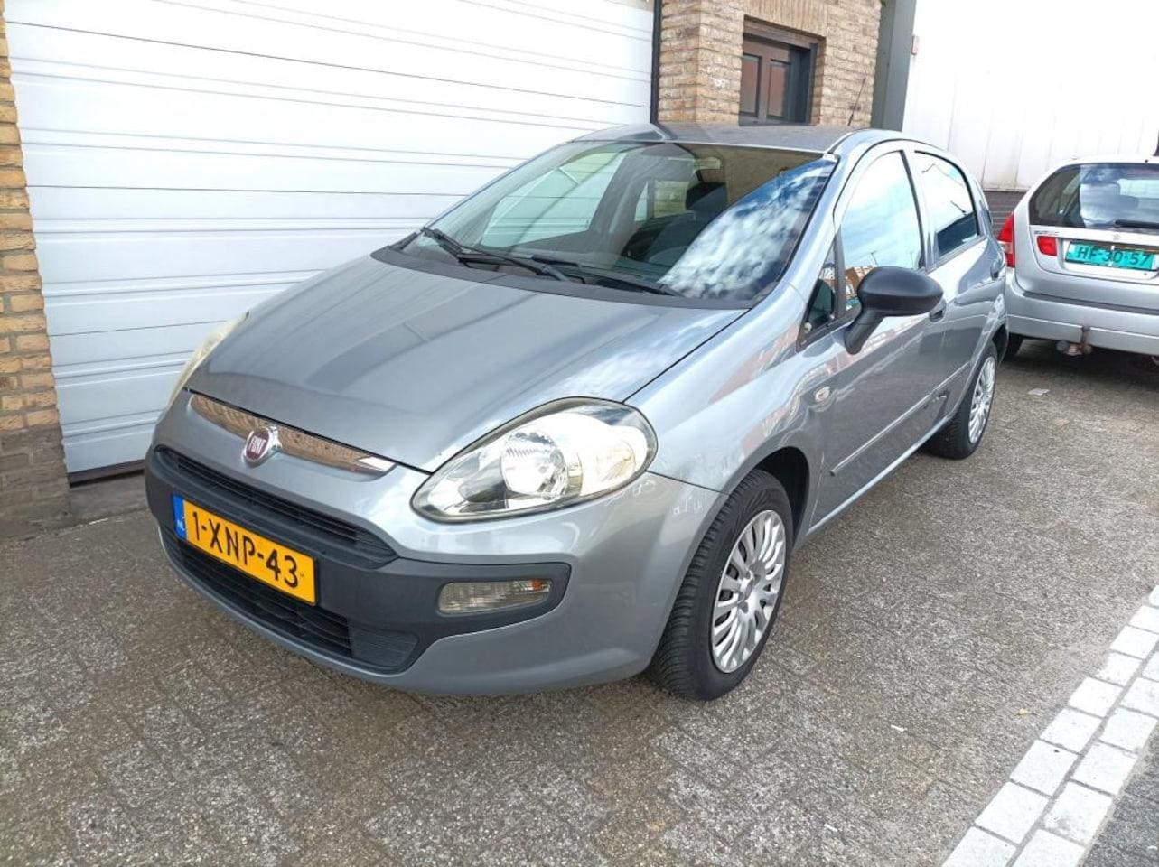 Fiat Punto Evo - 1.4 Dynamic 5 Deurs Airco APK 9-2026 - AutoWereld.nl