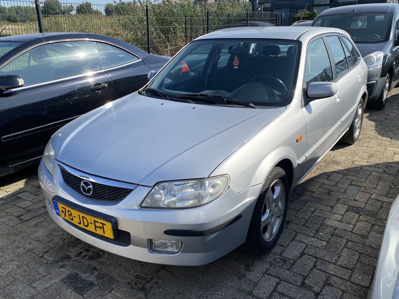 Mazda 323 Fastbreak - 1.6i Touring 1.6i Touring, AIRCO, 150.455 KM NAP, 2E EIGENAAR, APK TOT 25-08-26, ELEK-RAMEN, STUURBEKRA - AutoWereld.nl