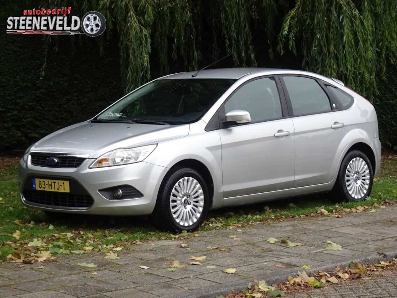 Ford Focus - 1.6 Ghia met Navi en Aicro - AutoWereld.nl
