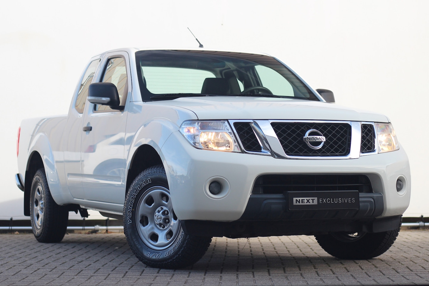 Nissan Navara - 2.5 dCi XE King Cab | Orig. NL | NAP | 1e eig - AutoWereld.nl