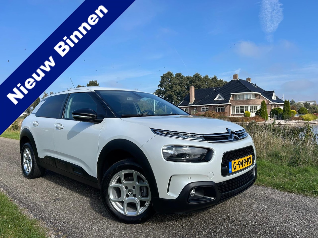 Citroën C4 Cactus - 1.2 PureTech Origins Trekhaak / Airco / Nieuwstaat! - AutoWereld.nl