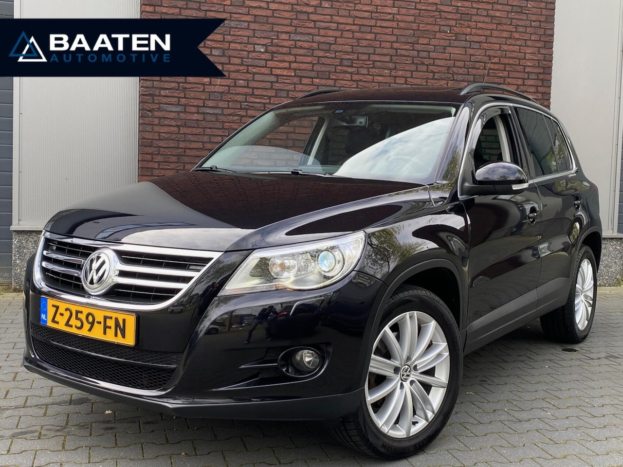 Volkswagen Tiguan - 1.4 TSI 150 PK 4Motion|Pano|Leder|Camera|Navi|Trekhaak - AutoWereld.nl
