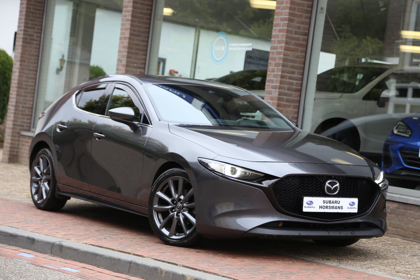 Mazda 3 - 2.0 e-SkyActiv-G M Hybrid l Luxury Navi HuD ACC BOSE LED 360view - AutoWereld.nl