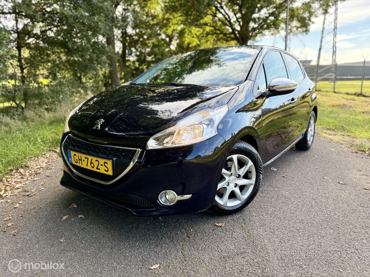 Peugeot 208 - 1.2 VTi 2015 5drs Airco Navigatie NAP ✅ - AutoWereld.nl