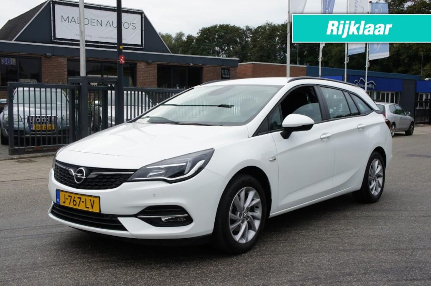 Opel Astra Sports Tourer - SPORTS TOURER EDITION 1.2 NAVI/CAMERA/LED/PDC/LMV/CRUISE PERFECTE STAAT - AutoWereld.nl