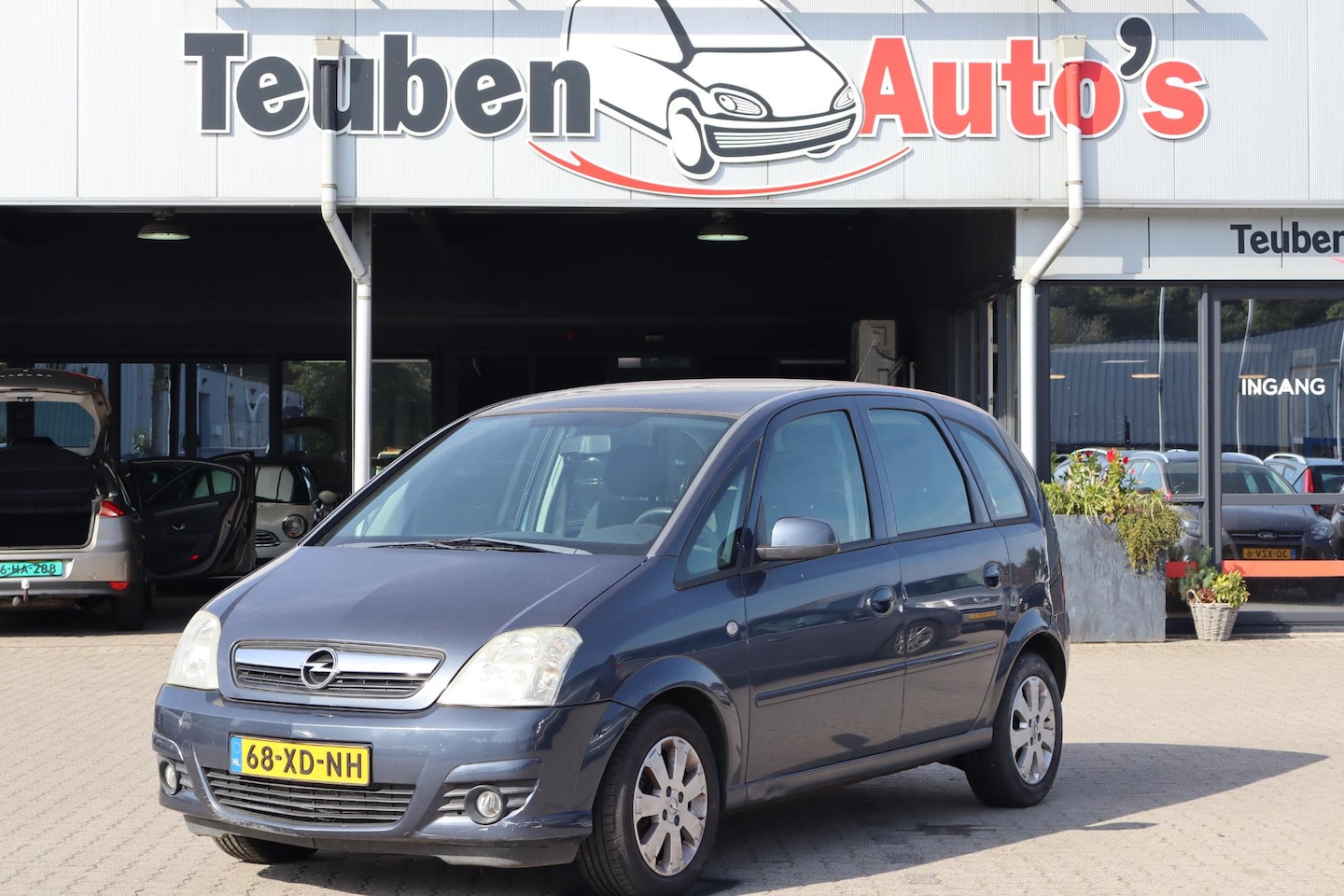 Opel Meriva - 1.4-16V Temptation Airco, Radio cd speler, Cruise control, Elektrische ramen, Trekhaak - AutoWereld.nl