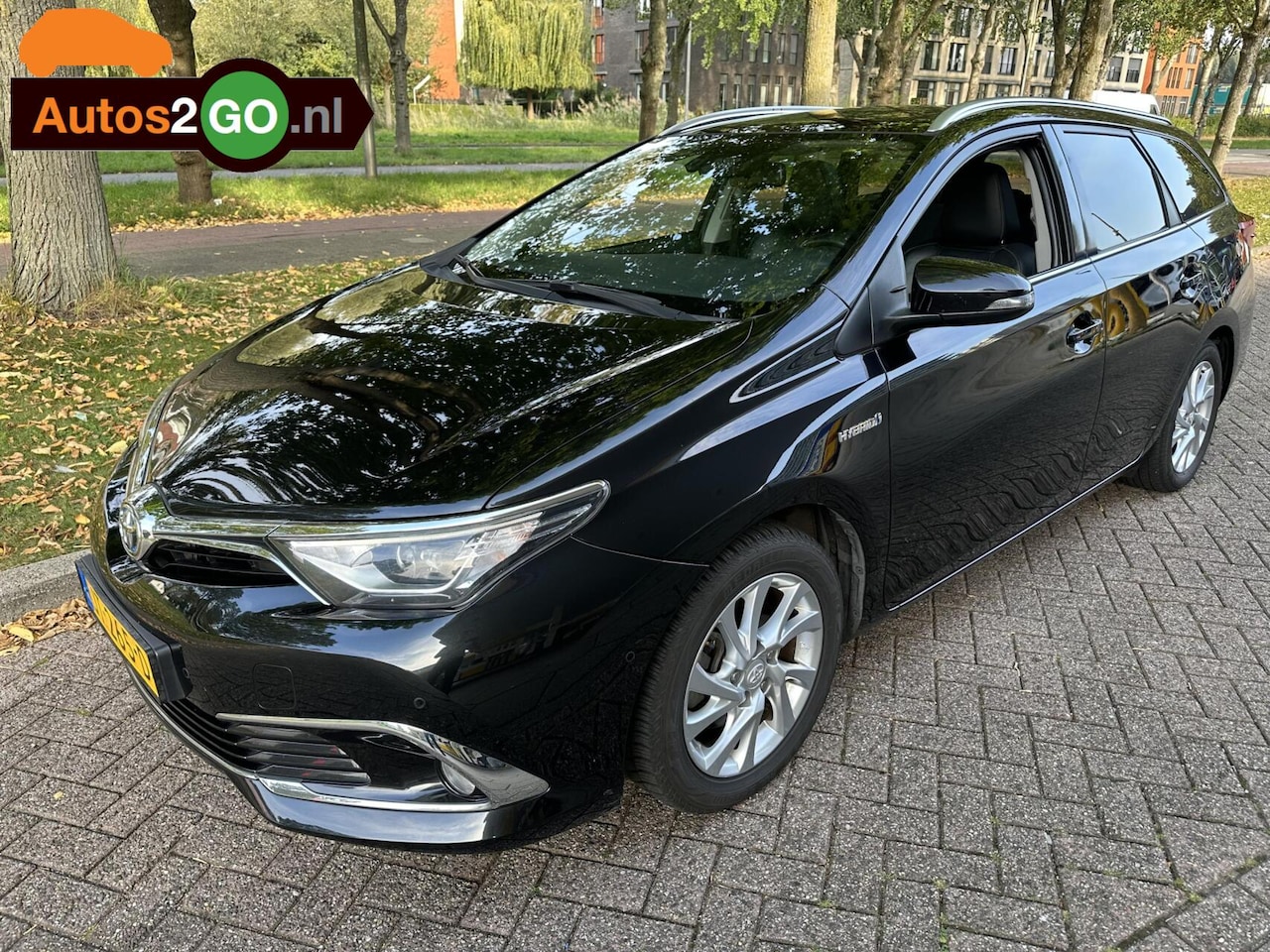 Toyota Auris - 1.8 Hybrid Executive I Navi I Pan. dak I parkeersensoren I verw. stoelen I camera I rijkla - AutoWereld.nl