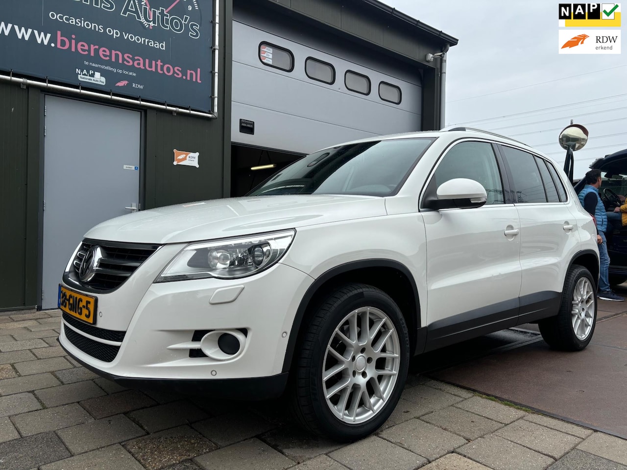Volkswagen Tiguan - 2.0 TSI Sport&Style 4Motion Aut Leder Navi - AutoWereld.nl
