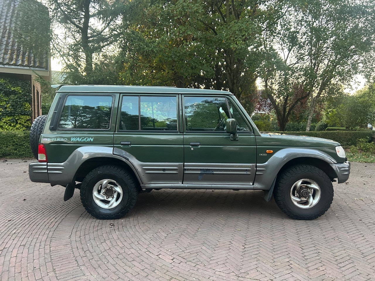 Hyundai Galloper - 2.5 TDI 4WD Airco L2 Wagon 7 Pers - AutoWereld.nl