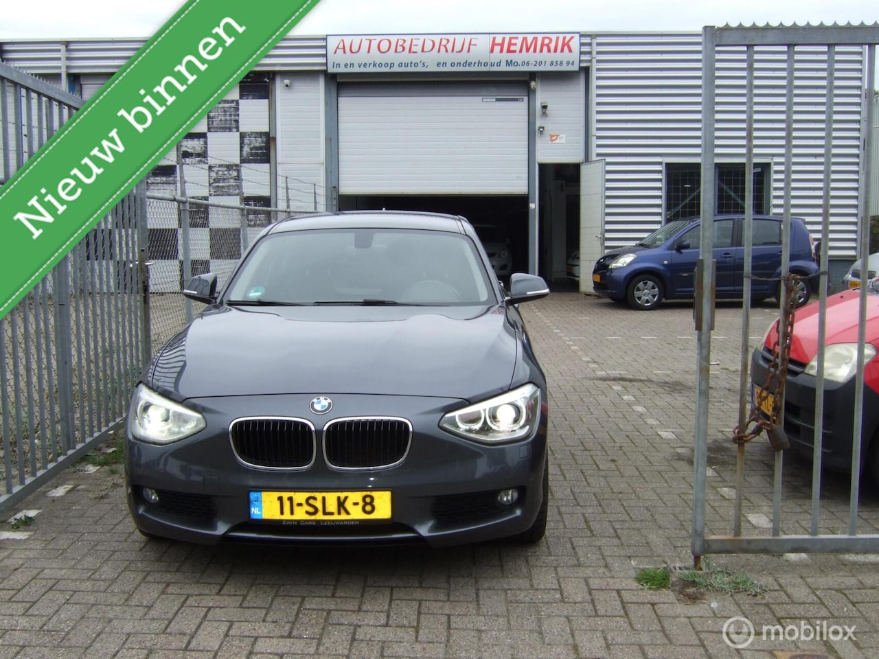 BMW 1-serie - 118d Business 118d Business - AutoWereld.nl