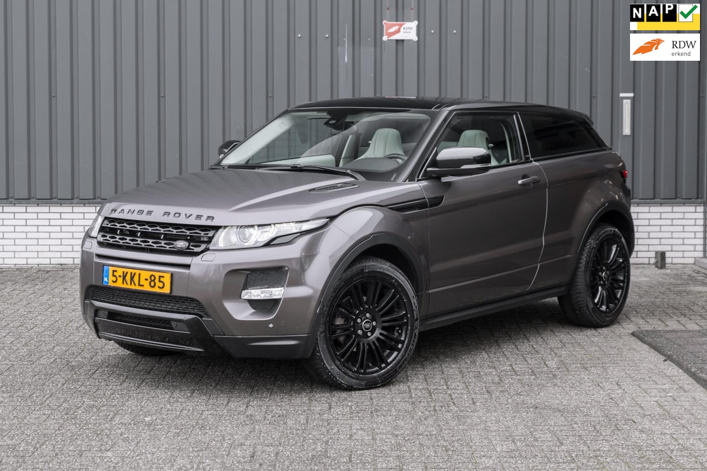 Land Rover Range Rover Evoque Coupé - 2.0 Si 4WD Sicilian Yellow *Volledig Onderhouden*Memory* - AutoWereld.nl