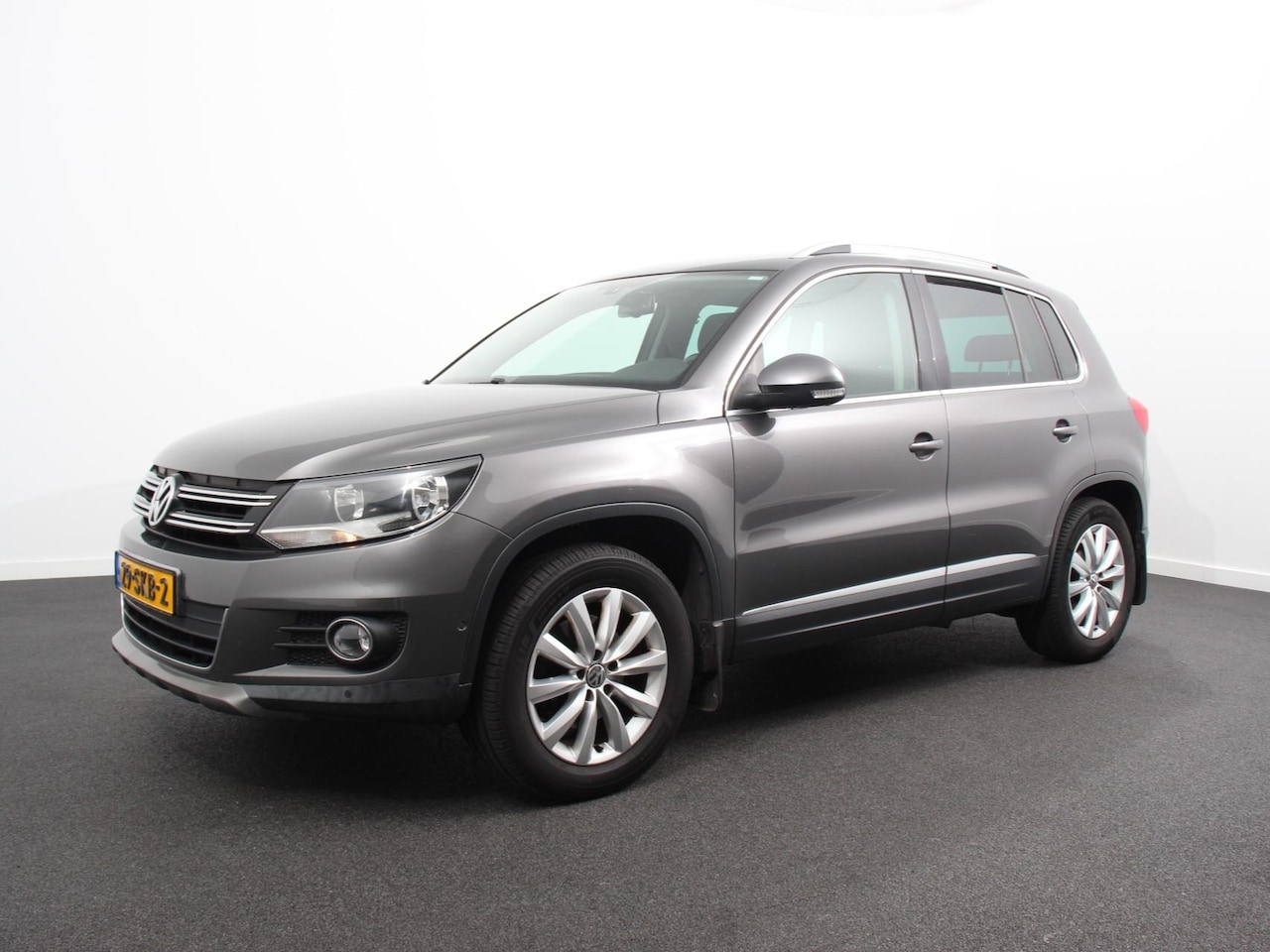 Volkswagen Tiguan - 1.4 TSI Sport&Style Clima Control Navigatie Lichtmetalen velgen Cruise control Handel Expo - AutoWereld.nl