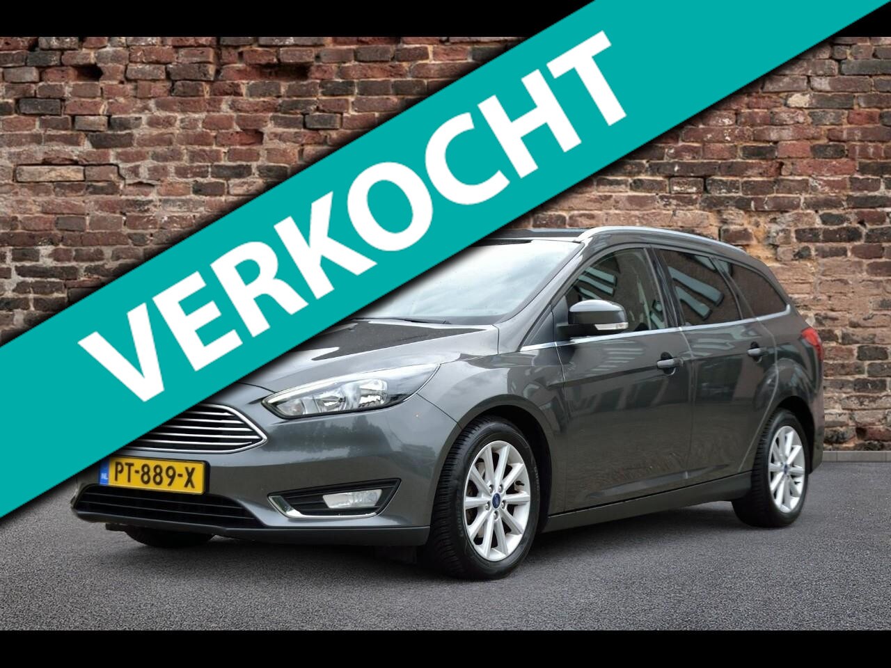 Ford Focus Wagon - 1.0 Titanium | Carplay | Navi | Stoelverwarming | Achteruitrijcamera - AutoWereld.nl