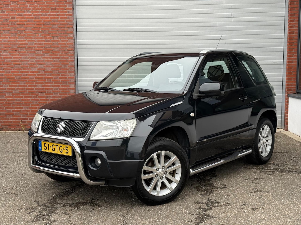 Suzuki Grand Vitara - 1.6-16V High Executive |TREKHAAK |4X4 | NAVI | 1 EIGENAAR . - AutoWereld.nl