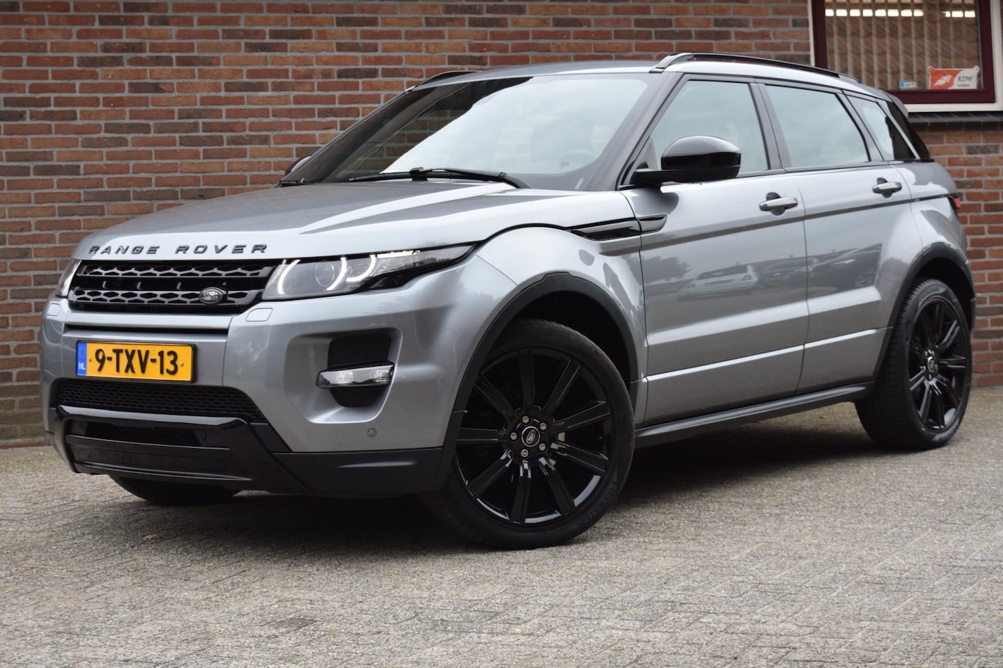 Land Rover Range Rover Evoque - 2.2 eD4 2WD Prestige '14 Xenon Pano Clima Cruise Inruil mogelijk - AutoWereld.nl