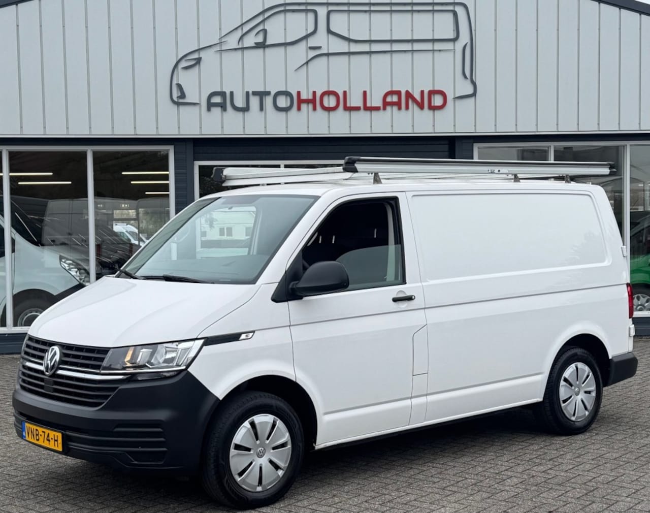 Volkswagen Transporter - 2.0 TDI 66KW 90PK EURO 6 AIRCO/ IMPERIAAL/ TREKHAAK/ PDC/ 100% DEALERONDERHOUDEN - AutoWereld.nl