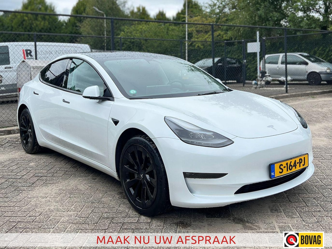 Tesla Model 3 - Long Range RWD Long Range AWD 75 kWh | Panoramadak | Leder - AutoWereld.nl