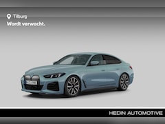 BMW i4 - eDrive40 High Executive 84 kWh | Trekhaak met elektrisch wegklapbare kogel | Hifi System |