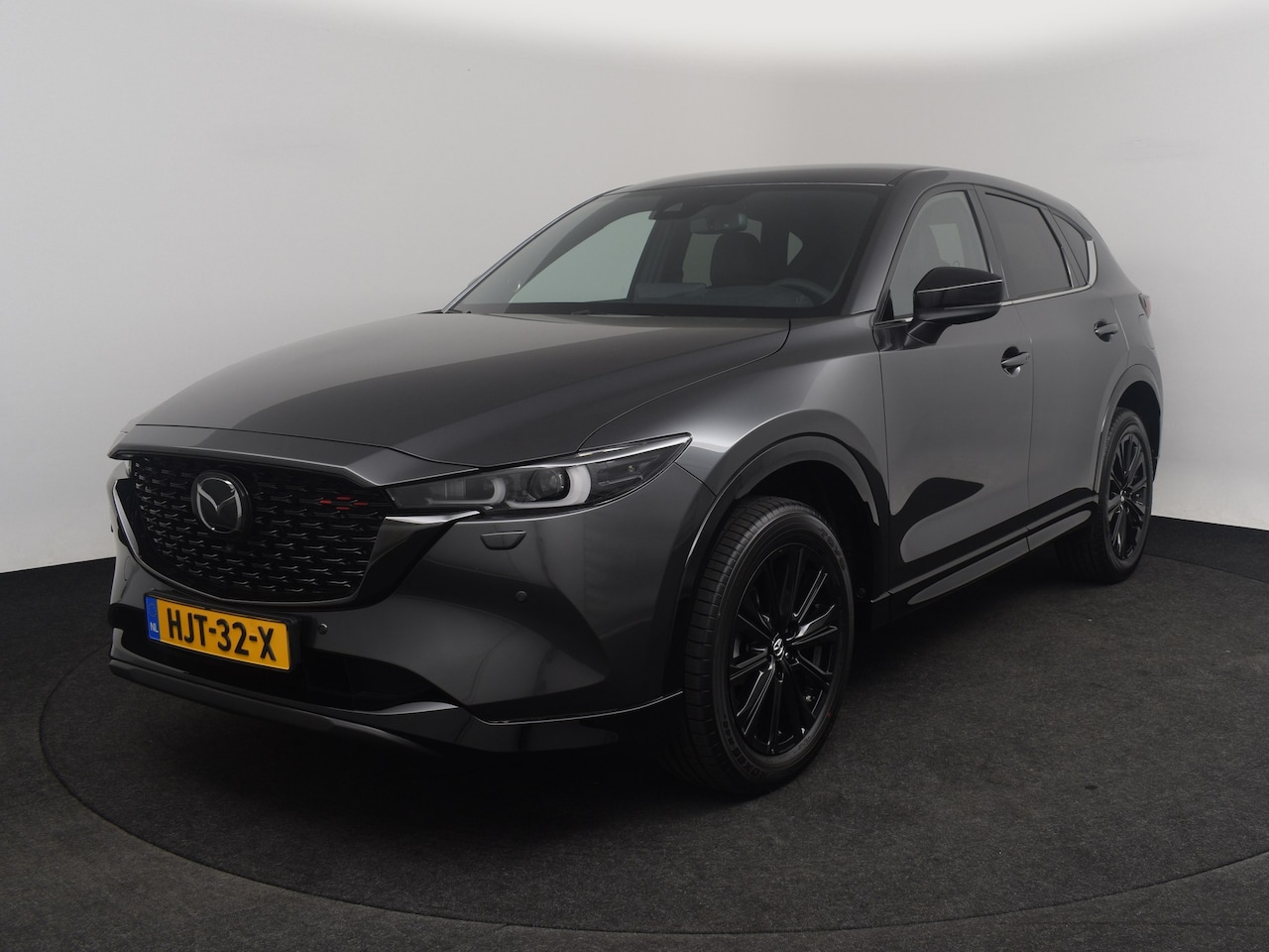 Mazda CX-5 - e-Skyactiv-G 165 Homura - Comfort Pack | 19-inch lichtmetalen velgen, Black Metallic | 360 - AutoWereld.nl