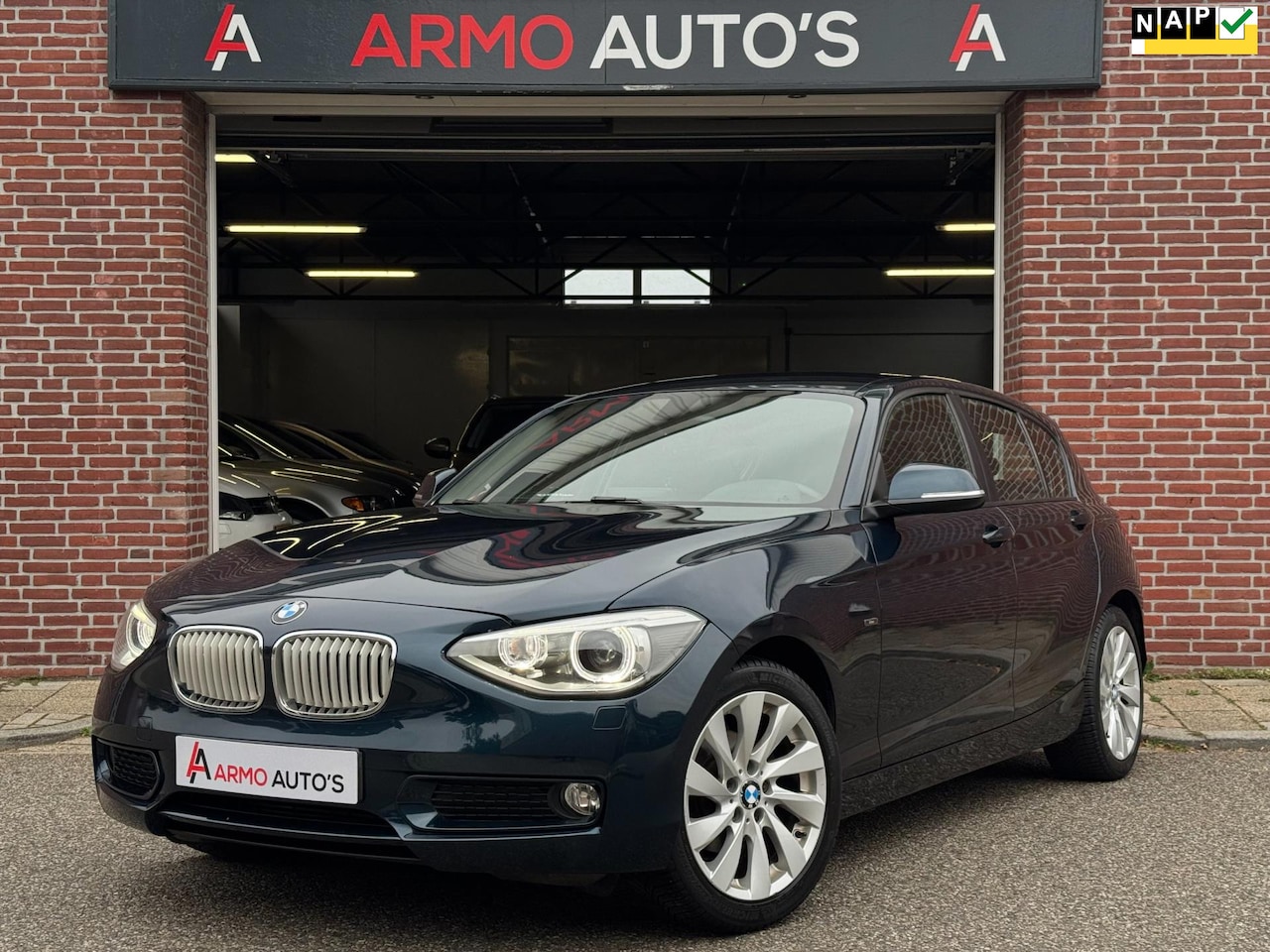 BMW 1-serie - 116i Urban | Airco | Cruise | Navi - AutoWereld.nl