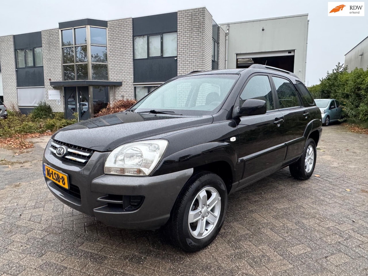 Kia Sportage - 2.0 CVVT Comfort Airco Trekhaak - AutoWereld.nl
