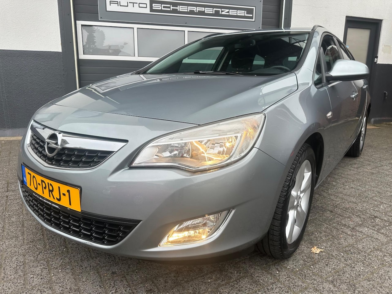 Opel Astra Sports Tourer - 1.6 Turbo 180pk Cosmo | AIRCO | NAVI | NL AUTO | - AutoWereld.nl