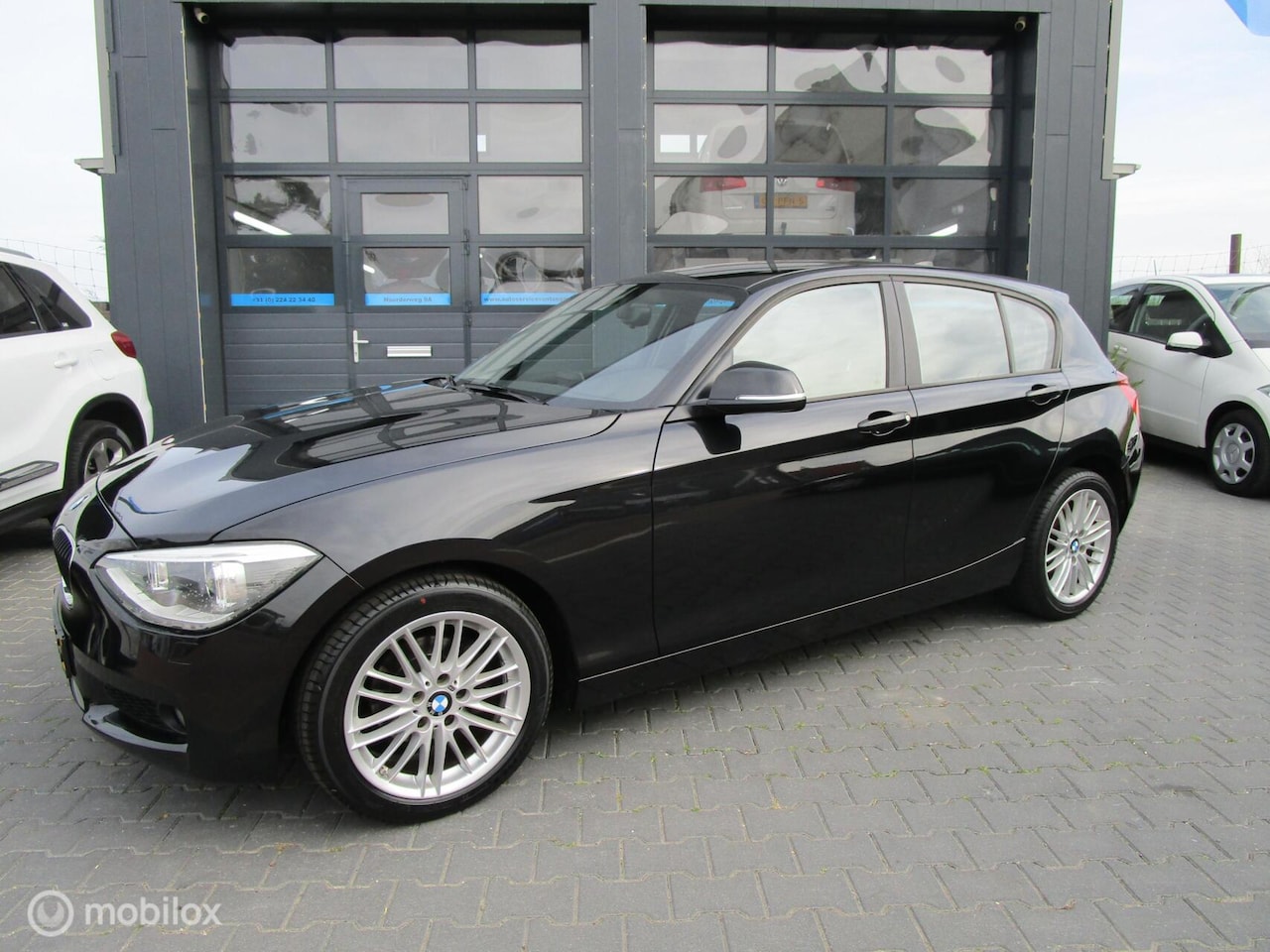 BMW 1-serie - 114i EDE Business+ 108dkm! Leer Airco Cruise NL auto - AutoWereld.nl