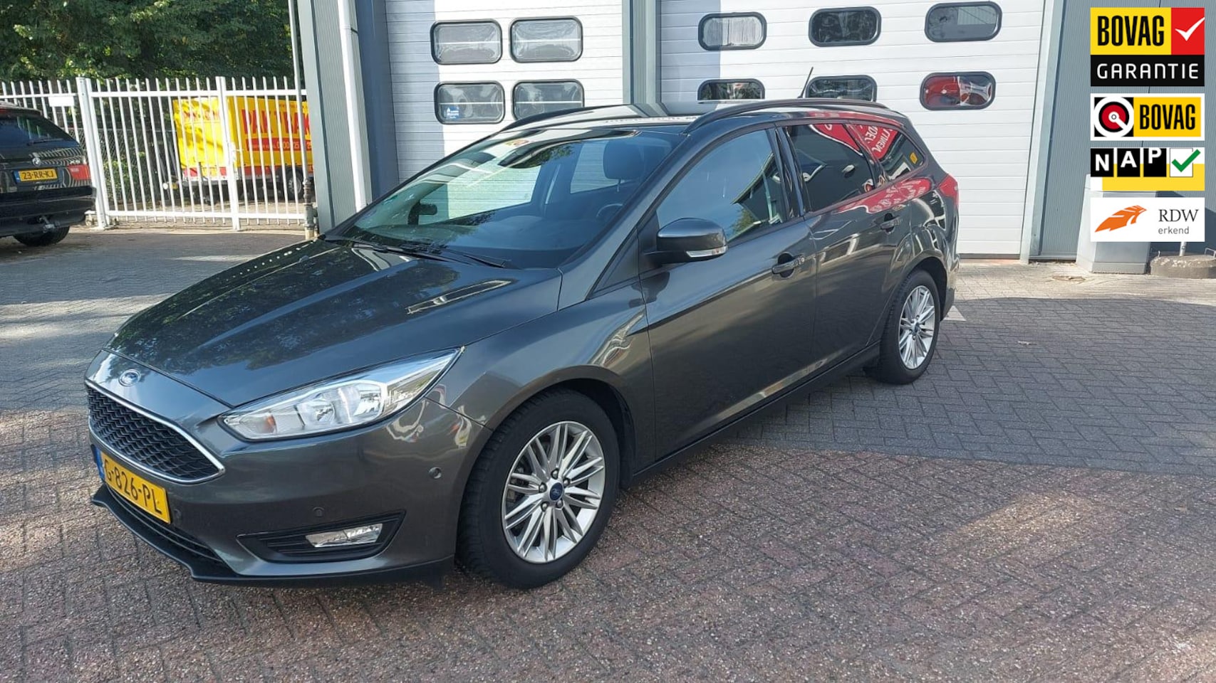 Ford Focus Wagon - 1.0 Titanium 125pk nieuw Distributie / cruise / airco - AutoWereld.nl