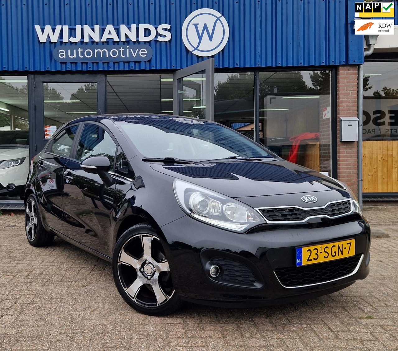 Kia Rio - 1.2 CVVT Super Pack Keyless Clima Cruise Parks Lm - AutoWereld.nl
