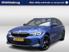 BMW 3-serie Touring - 330e xDrive / Navigatie / Camera / Parkeersensoren V+A / Head up / Leder-alcantara / Carpl