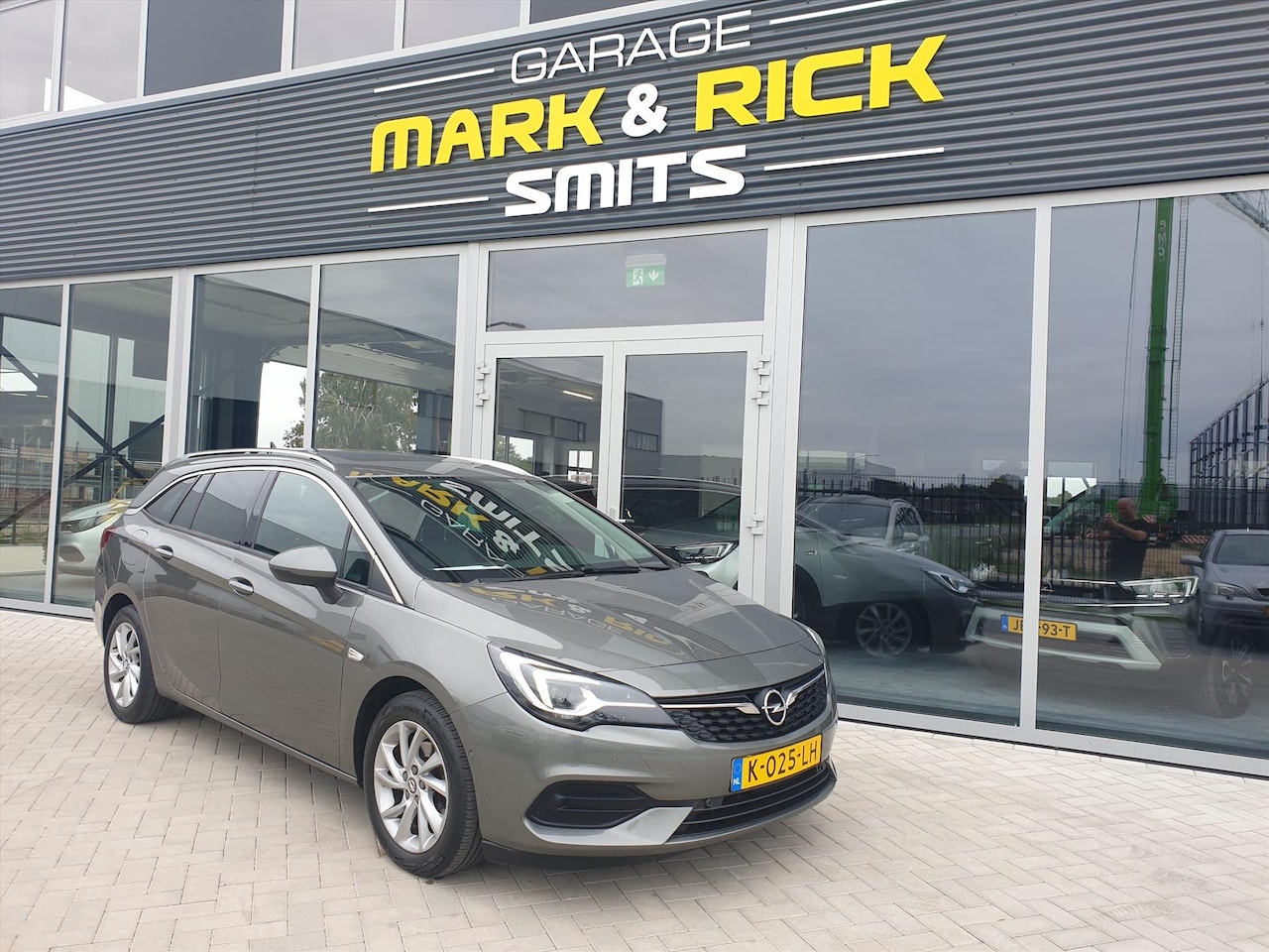 Opel Astra Sports Tourer - 1.2 Turbo 130pk Start/Stop Business Executive - AutoWereld.nl