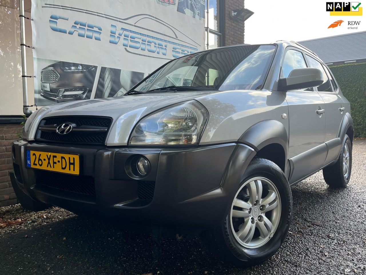 Hyundai Tucson - 2.0i Style Premium|Airco|Trekhaak|Leder|Cruise| - AutoWereld.nl